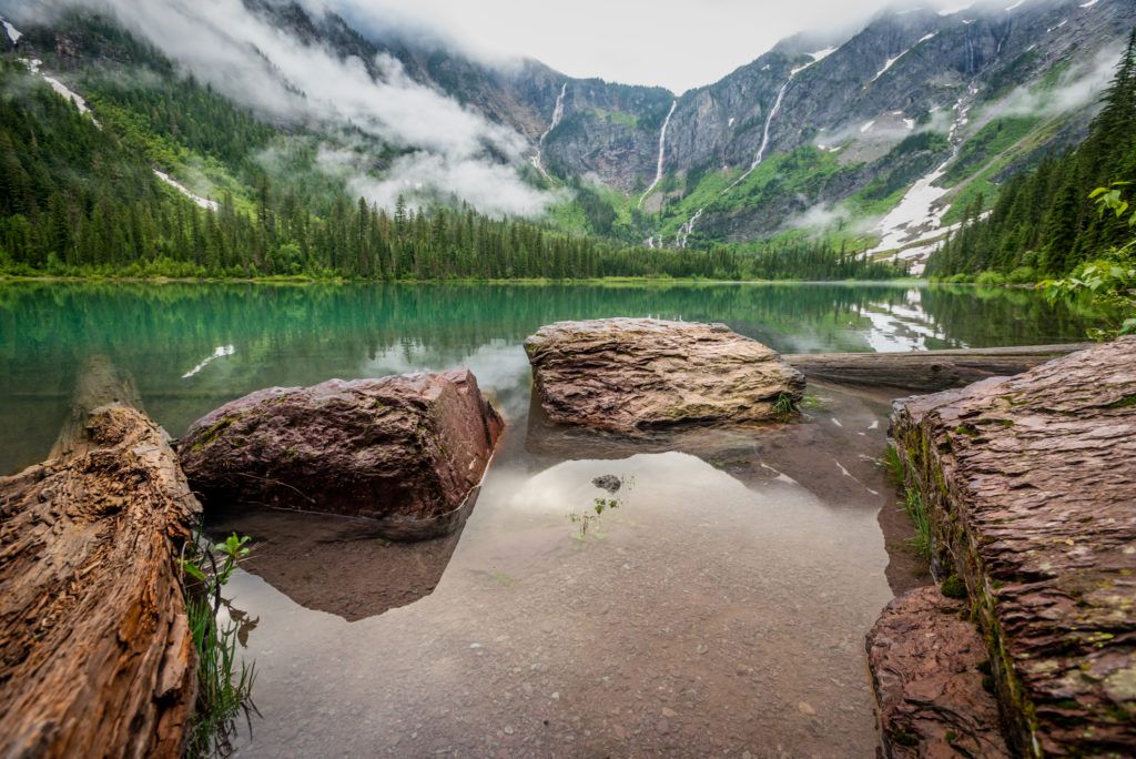 Rocks At The Edge of Avalanche Lake | Travel Destinations in the U.S.