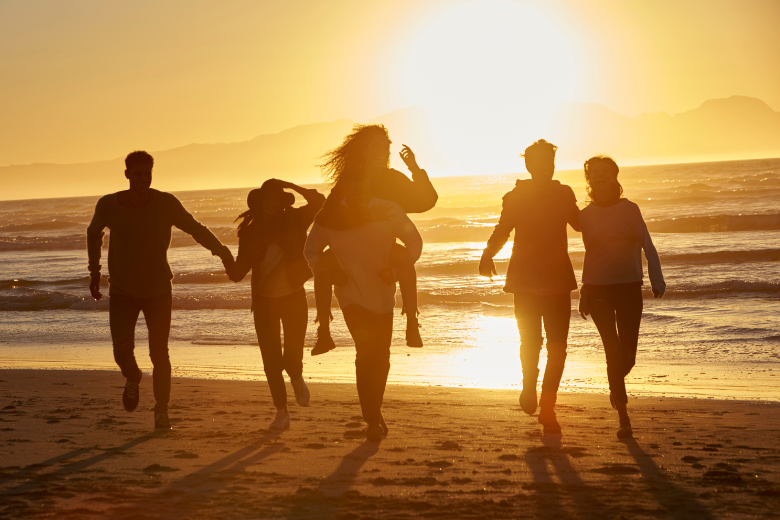 Friends on the Beach During Fall