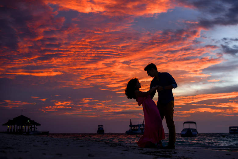 Couple on Beach at Sunset