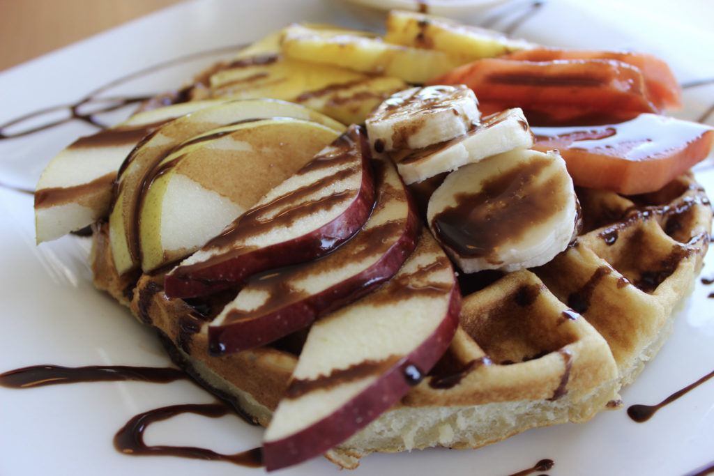 Waffle topped with apples, banana, and chocolate | Rocky Point Best Breakfast Restaurants 