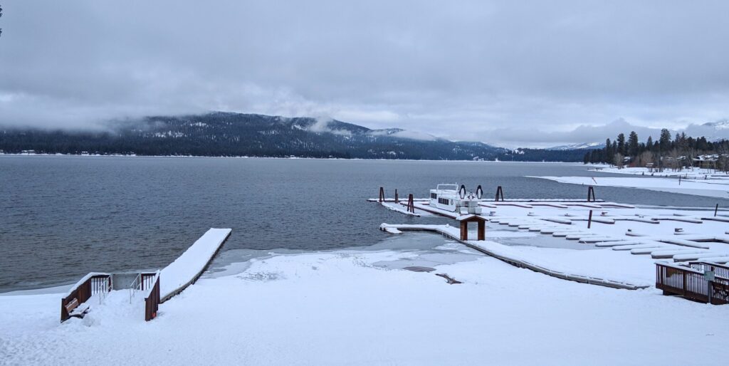 Snow on the docks at Payette Lake.