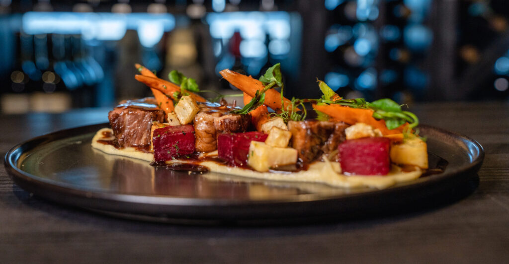 Unique steak dish placed on a table.