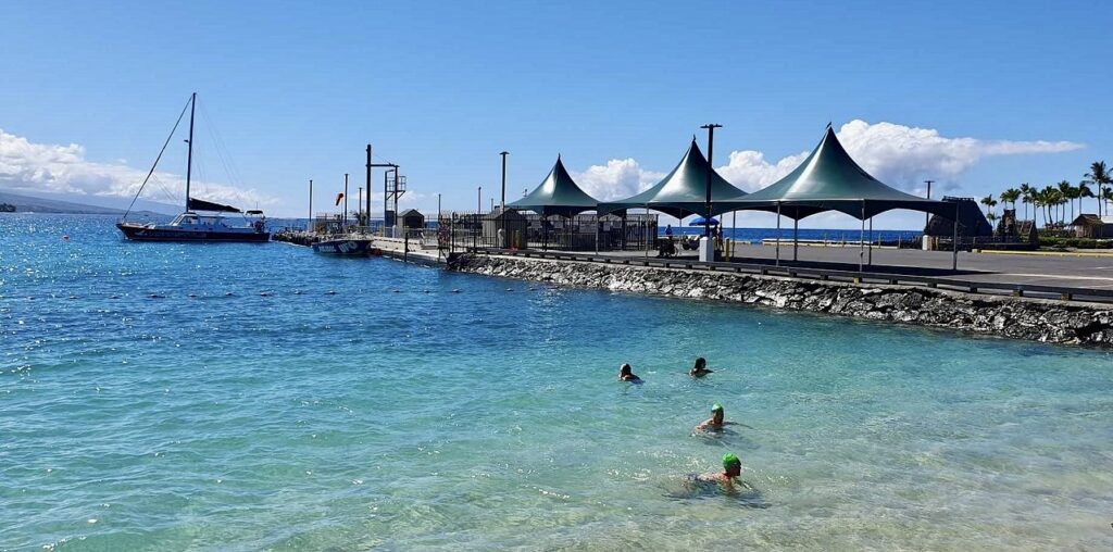 pier and swimmers