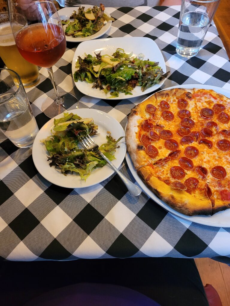 salad, pizza, wine